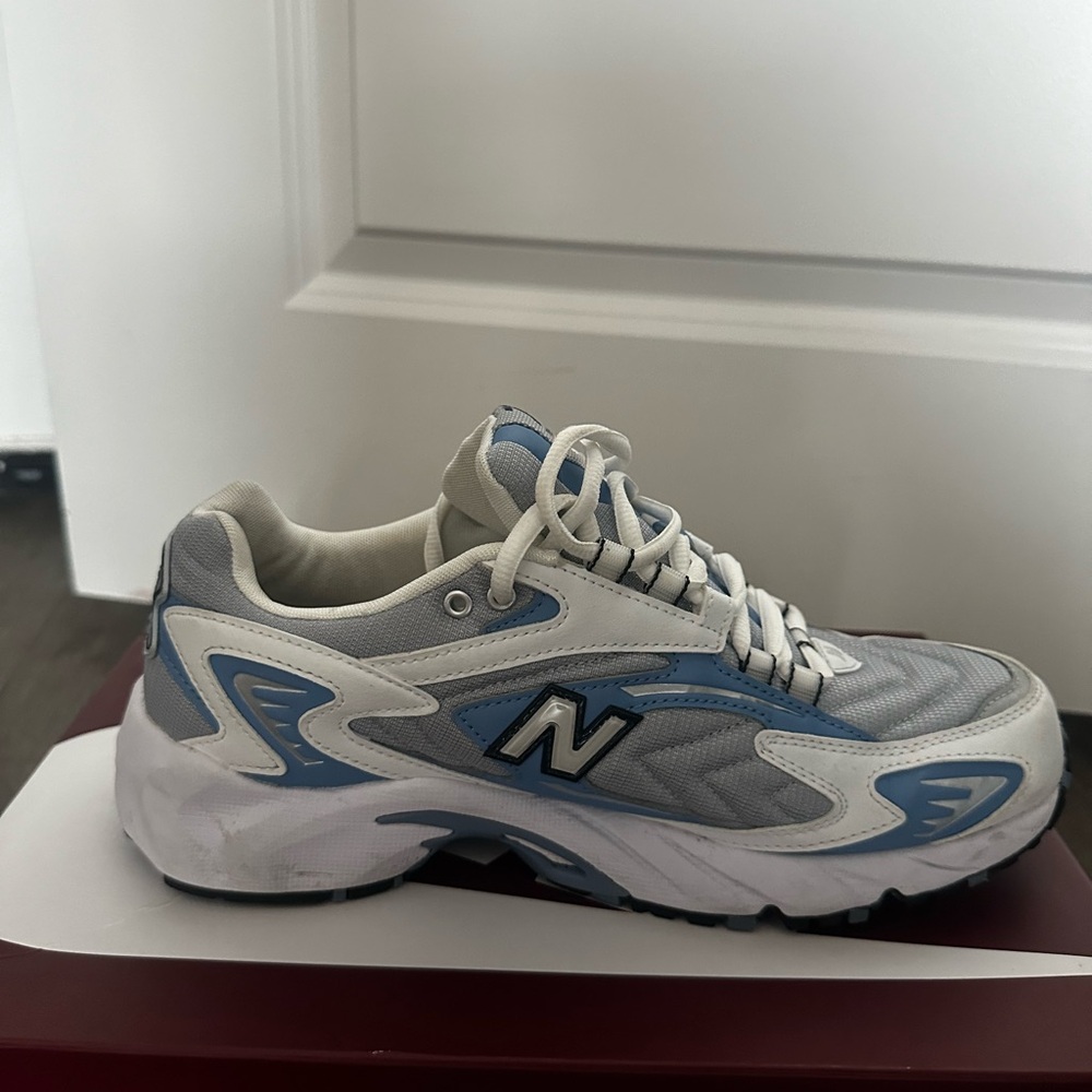 New Balance White and Light Blue Athletic Shoes